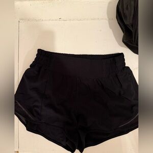Black Lululemon Hottie Hot Shorts. Size 6 with 4” inseam. Great condition